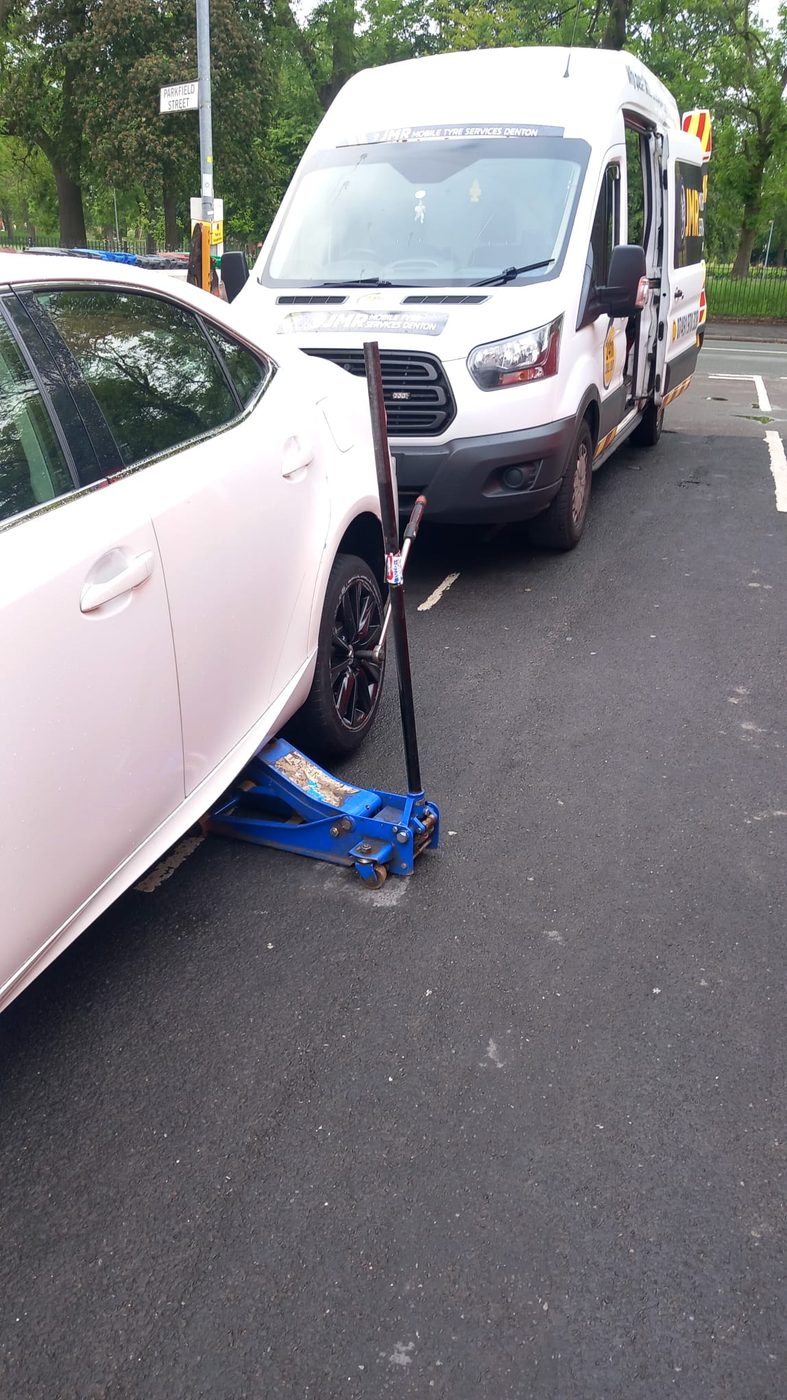 Rocco Mobile Tyres van parked on site next to a customer's car